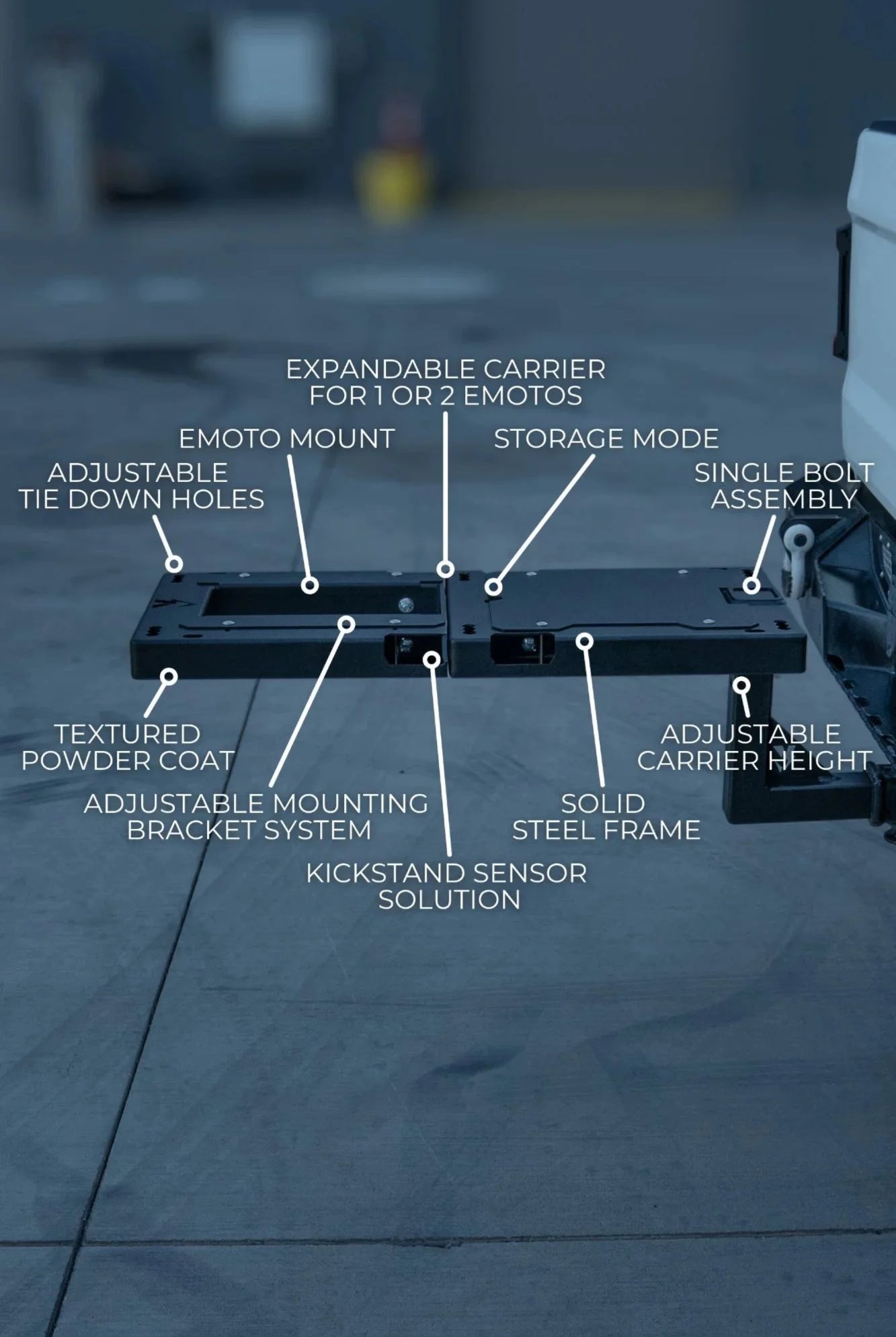 Foot-peg anchor mount on a Surron Ultra Bee e-moto hitch rack