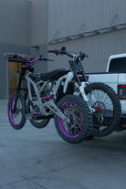 Surron Ultra Bee and Talaria e-moto hitch rack carrying two electric dirt bikes
