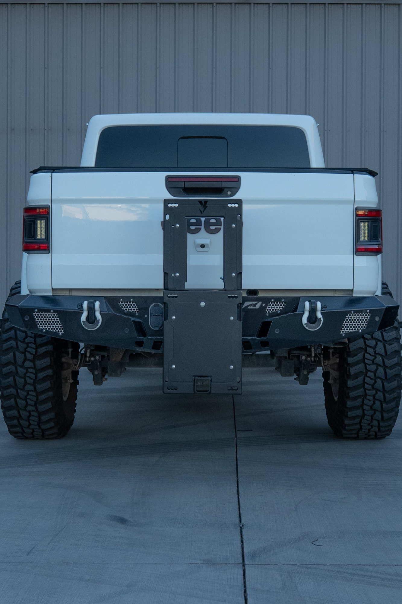 Foldable e-moto bike rack on a truck for ETM RTR and Ventus One Plus e-motos
