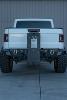 Foldable e-moto bike rack on a truck for ETM RTR and Ventus One Plus e-motos