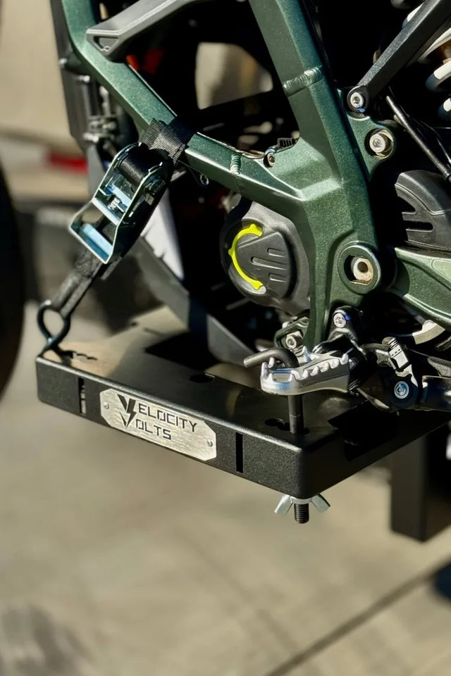 close up surron ultra bee on bike rack